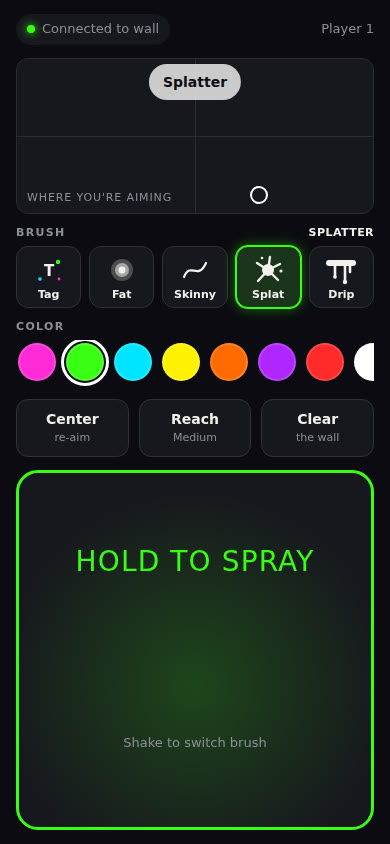 Phone controller with aim preview, five pen icons, color swatches, Center, Reach and Clear buttons, and a large hold-to-spray pad